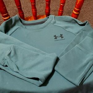Under armor sweatshirt, green, 80% cotton 20% polyester.  Size small